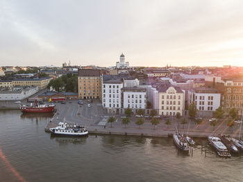 High angle view of river amidst buildings in city