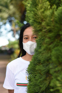 Portrait of young woman outdoors