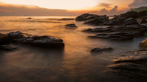 Scenic view of sea against sky during sunset