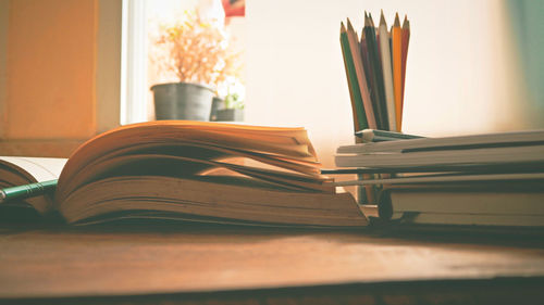 Close-up of book on table at home