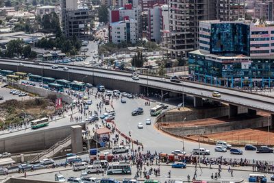 High angle view of vehicles on road in city