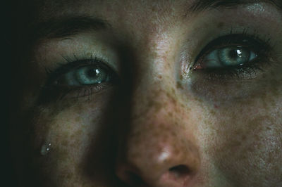 Close-up of woman crying