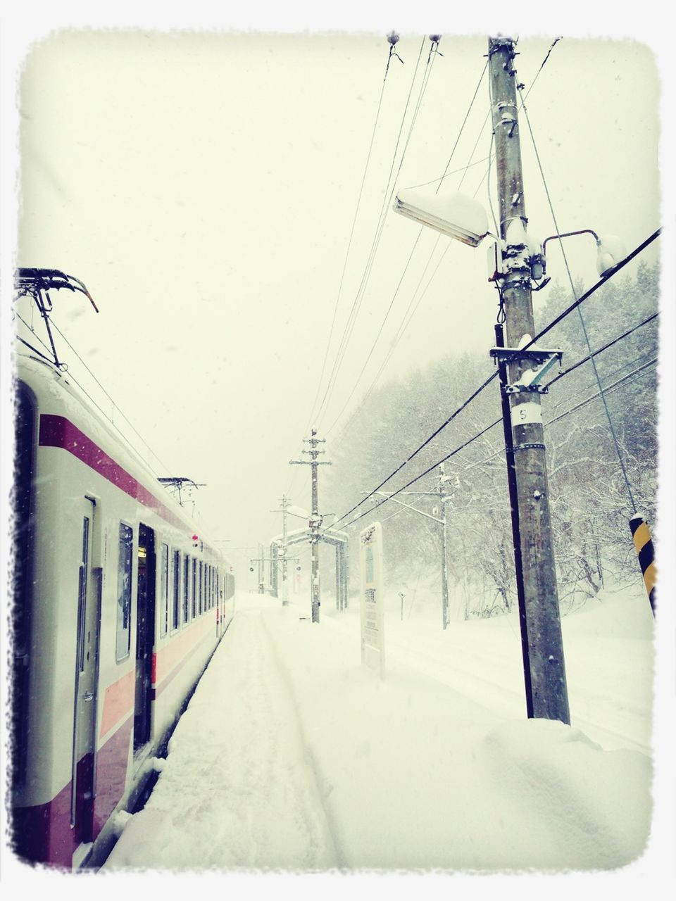 the way forward, architecture, built structure, transfer print, building exterior, power line, transportation, diminishing perspective, electricity pylon, auto post production filter, clear sky, street, cable, vanishing point, road, day, connection, snow, outdoors, long