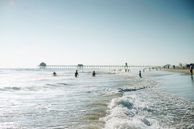 Scenic view of beach against clear sky