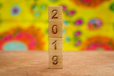 Close-up of number 2019 on table