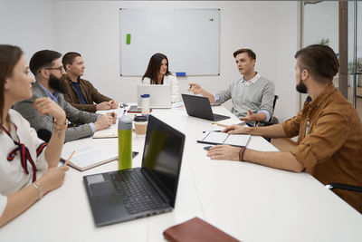 Business colleagues working at office