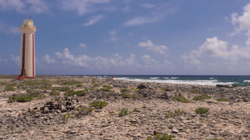 Scenic view of sea against cloudy sky