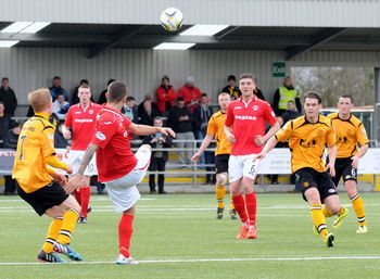Group of people playing soccer