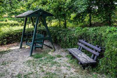 Empty bench in park