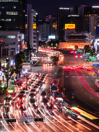 Light trails on city street at night