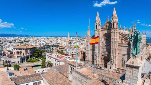 Aerial view of the spanish flag near the la seu in mallorca, spain.