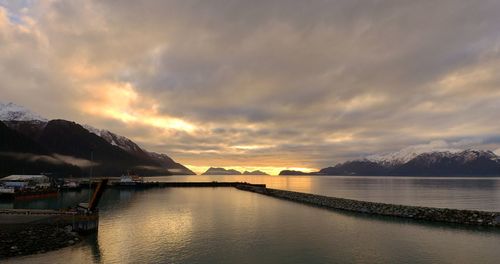 Scenic view of lake against sky during sunset