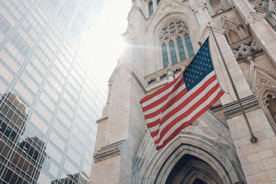 Low angle view of flag against sky