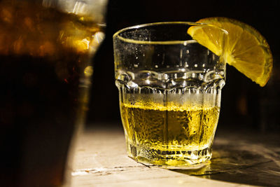 Close-up of beer glass on table