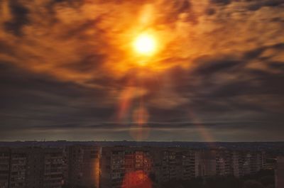 View of city against cloudy sky