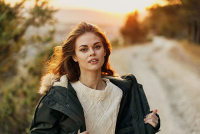 Portrait of young woman in winter