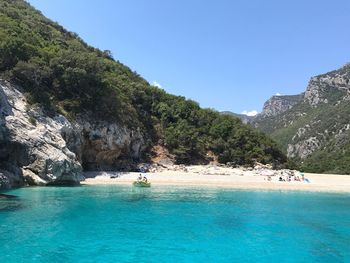 Scenic view of sea against clear blue sky