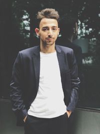 Portrait of young man wearing blazer