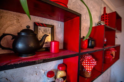 Banks with cereals on a wooden shelf