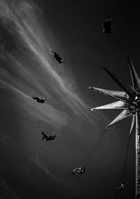 Low angle view of airplane flying in sky