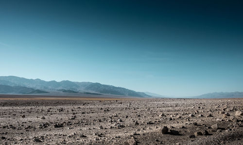 Scenic view of desert against clear sky