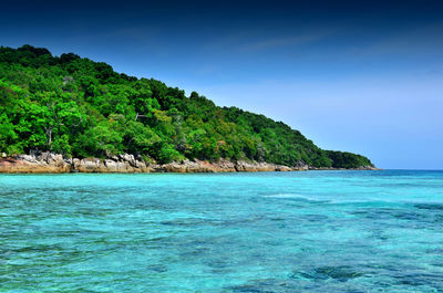 Scenic view of calm sea against clear sky