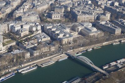 High angle view of river amidst buildings in city