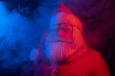 Portrait of santa clause in smoky room