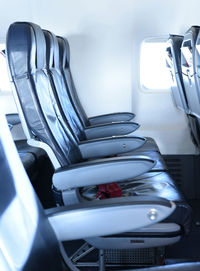 Empty vehicle seats in airplane