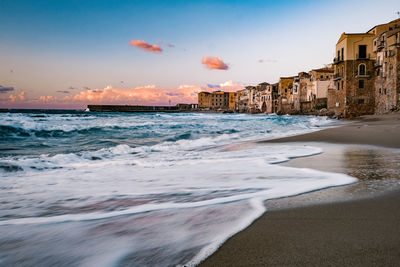 Scenic view of beach against sky