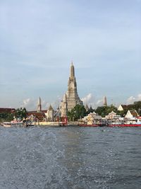 Wat arun bangkok with a splash of water
