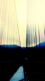 Suspension bridge at sunset