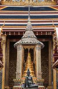 Statue of temple in building