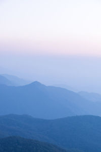 Scenic view of mountains against sky during sunset