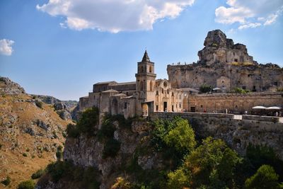 Low angle view of old ruins against sky