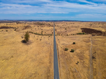 Aerial view of a country road in spring.