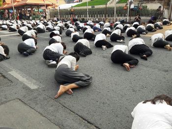 High angle view of people sitting outdoors