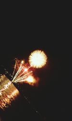 Low angle view of firework display