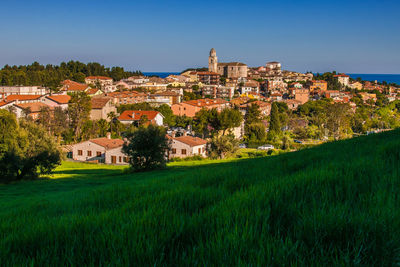 View of townscape against clear sky