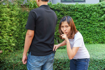 Young couple standing outdoors