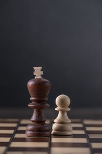 Close-up of chess pieces against blurred background