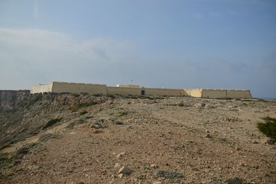 Low angle view of sagres fortress against sky