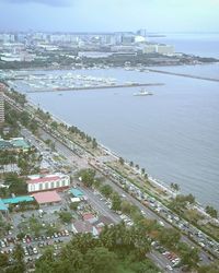 High angle view of a city by sea