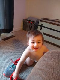 Portrait of cute baby boy at home