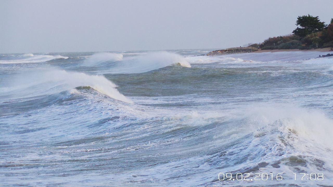 WAVES SPLASHING ON SHORE