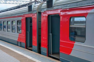 Red train at railroad station