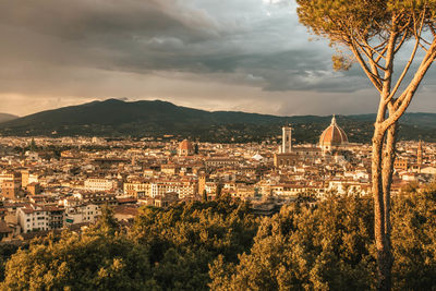 High angle view of cityscape against sky at sunset