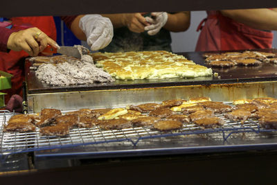 High angle view of person preparing food at store