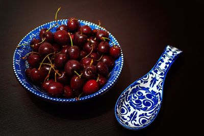 High angle view of fruits in plate on table