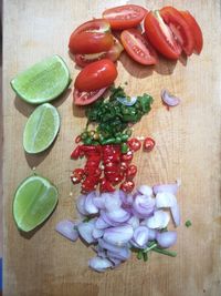 High angle view of chopped vegetables on cutting board